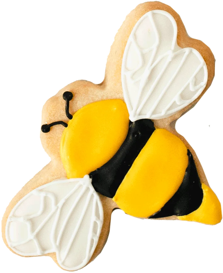 thee-buzz Bee-shaped cookie decorated with yellow and black icing, white wings, and cute facial features, perfect for bakery and cake decorating supplies.