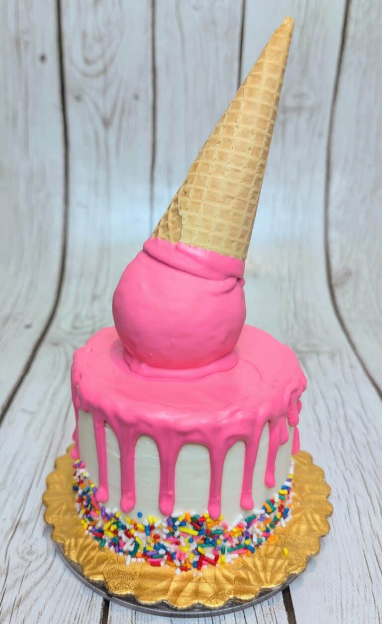 ice cream cake Pink ice cream cone drip cake with sprinkles