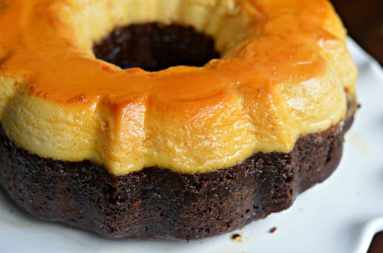 chocoflan 1 Chocolate and flan cake on a white plate.