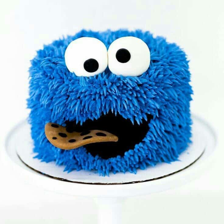 cookie monster cake Blue monster cake with a cookie mouth.