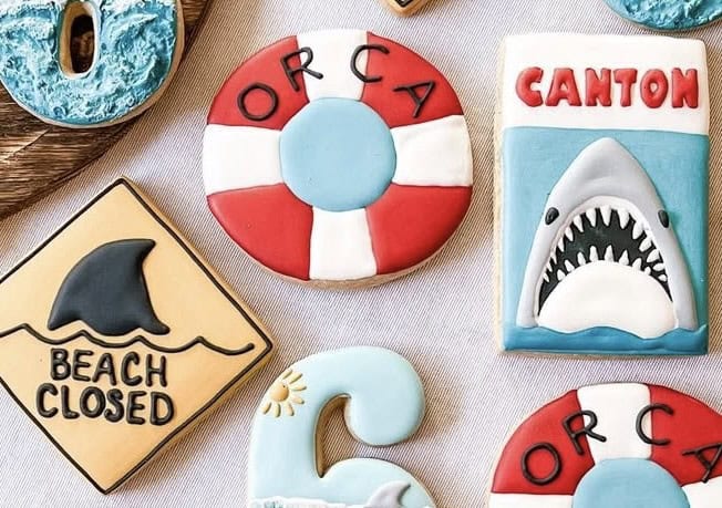 jaws cookies Shark-themed decorated cookies and warning signs.