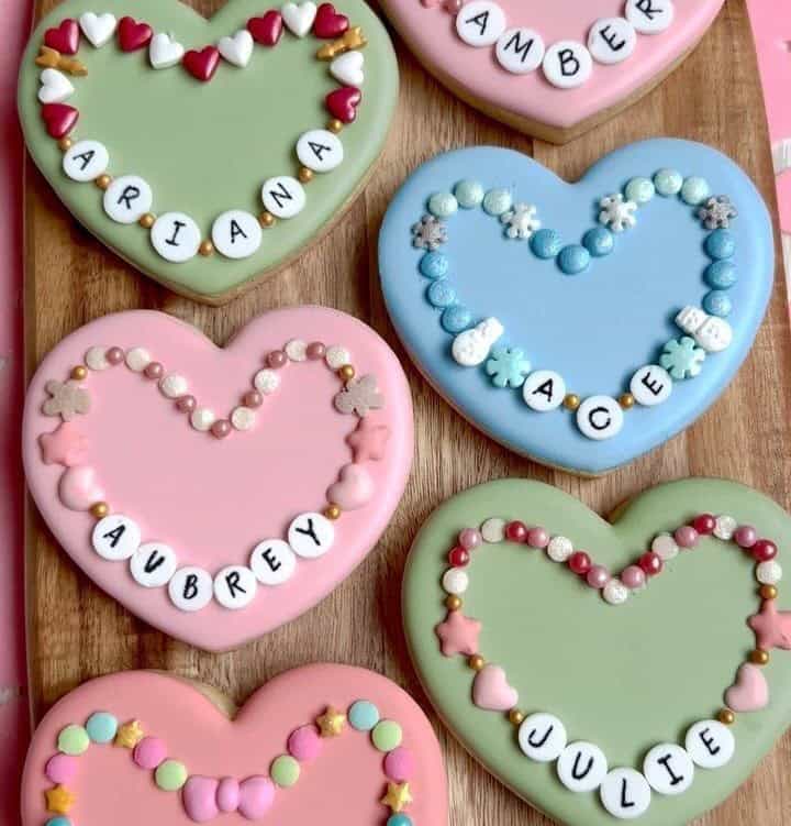 kids camp friendship bracelet cookies Colorful heart-shaped cookies with personalized designs.