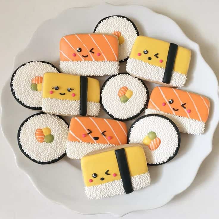 sushi cookies Cute sushi-themed decorative cookies on a plate.