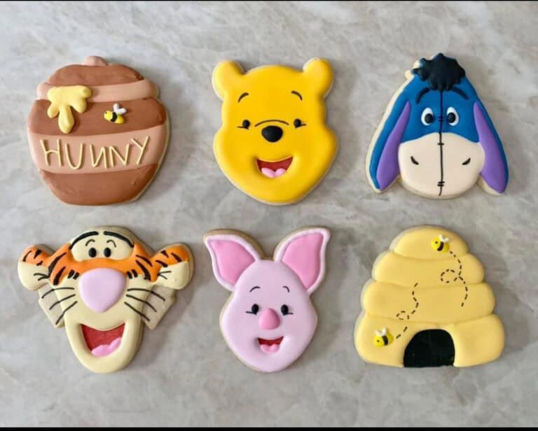 img 5034 Decorated cookies of cartoon characters and honey jar.