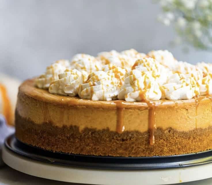 img 5037 Caramel pumpkin cheesecake with whipped cream topping.