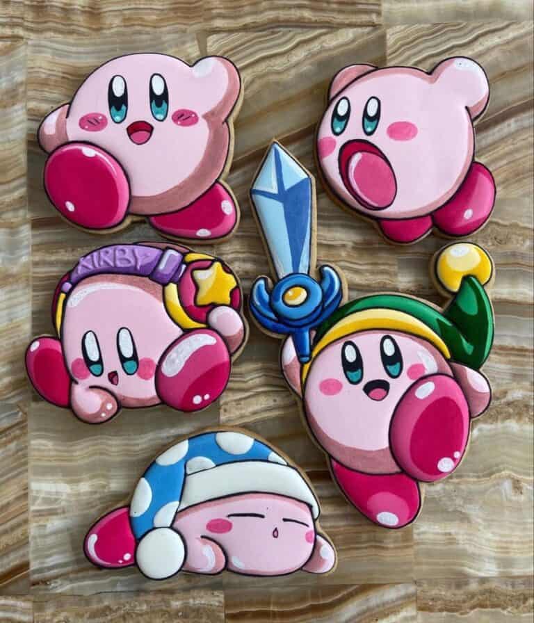 img 5038 Colorful Kirby cookies on a marble surface.