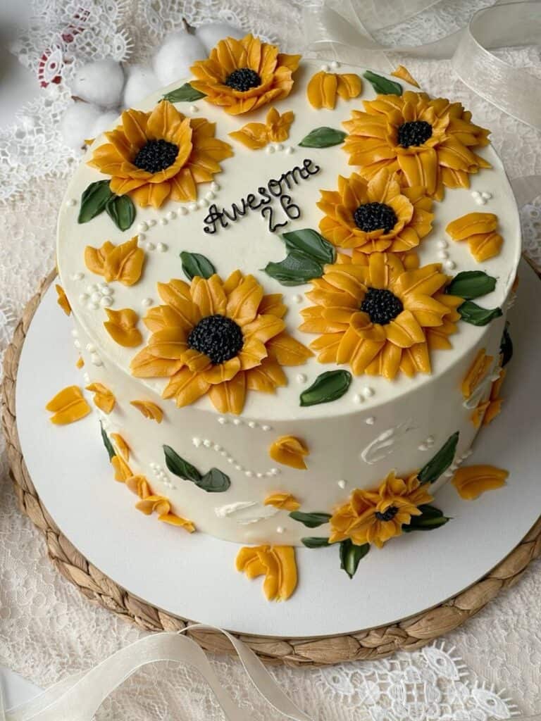 sunflower sel cake Sunflower cake with 'Awesome 26' message.