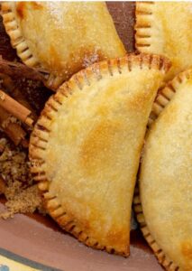 Golden baked pastries with a flaky crust, perfect for cake decorating or baking supplies at Over the Top Cake Supplies.