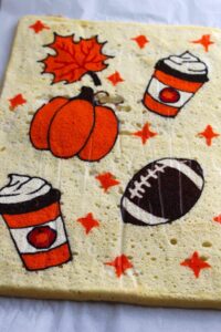 Pumpkin and coffee cup cake decorating sheet with fall and football theme for baking celebration.