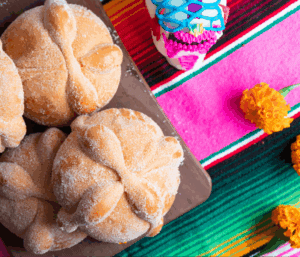 Crispy Mexican wedding cookies dusted with powdered sugar, traditional baked treats for celebrations, at Over the Top Cake Supplies.