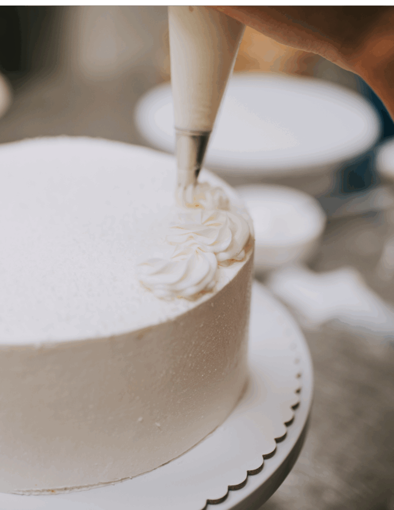 Elegant cake decorating with professional piping techniques for cakes, featuring top-quality cake supplies from Over the Top Cake Supplies. Perfect for bakers and cake decorators.