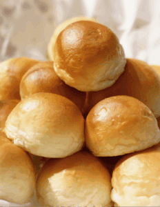 Soft, golden-brown cake pop balls perfect for cake decorating and baking supplies, available at Over the Top Cake Supplies.