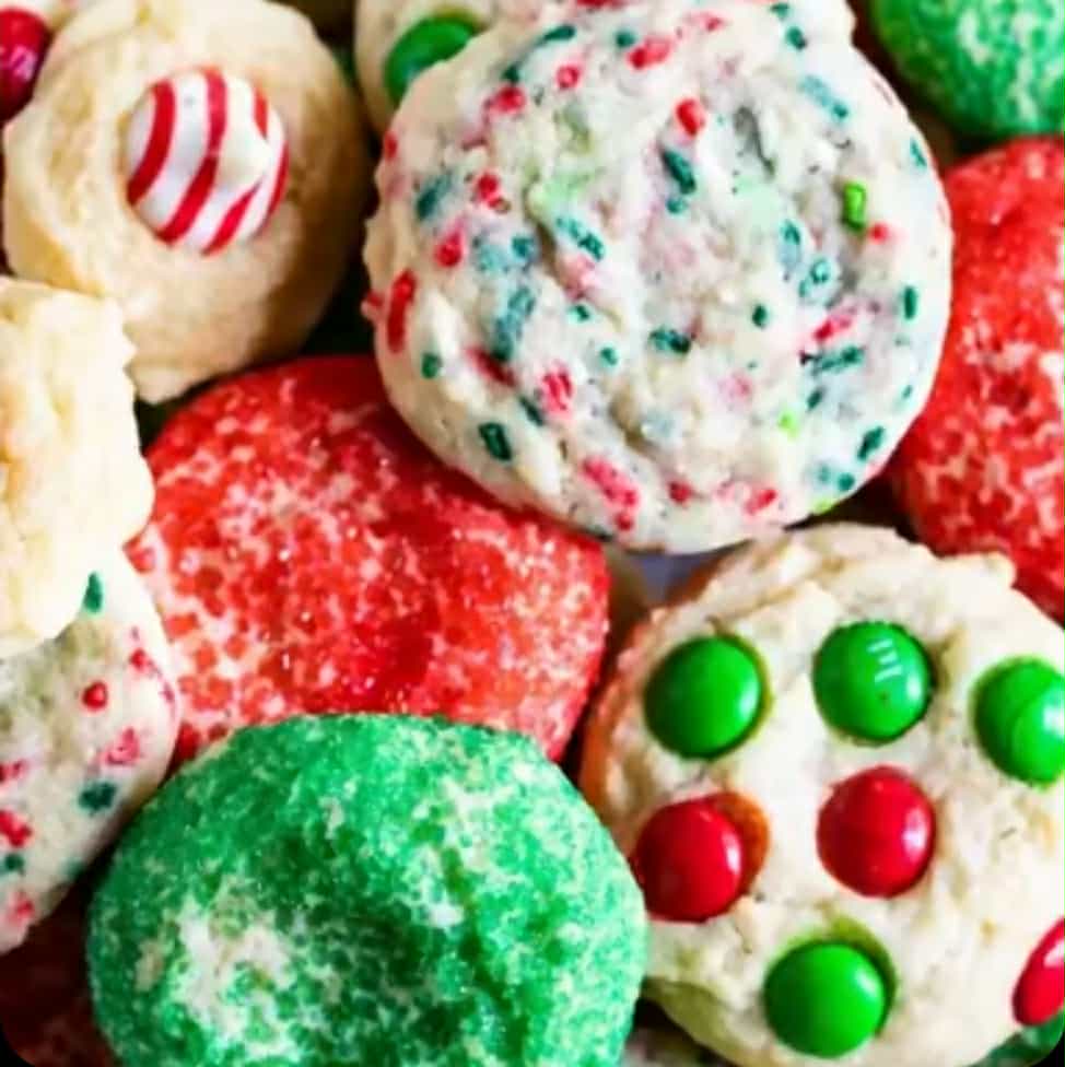 Christmas cookie assortment, holiday cookies with colorful sprinkles and festive decorations, decorated butter cookies, sugar cookies, cookie gift box, baking supplies, holiday baking, cookie decorating, Christmas treats.