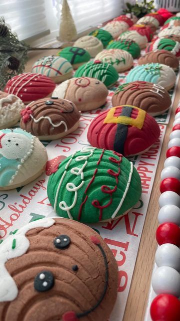 dd11c59f57a945fec9cf1a63cccad14a Colorful Christmas-themed decorated cookies with festive icing, sprinkles, and holiday designs, perfect for holiday baking and cake decorating supplies.