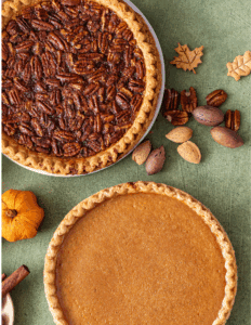 Sweet pecan pie with a golden crust and caramelized filling on a rustic green surface. Perfect for holiday desserts and baking needs from Over the Top Cake Supplies.