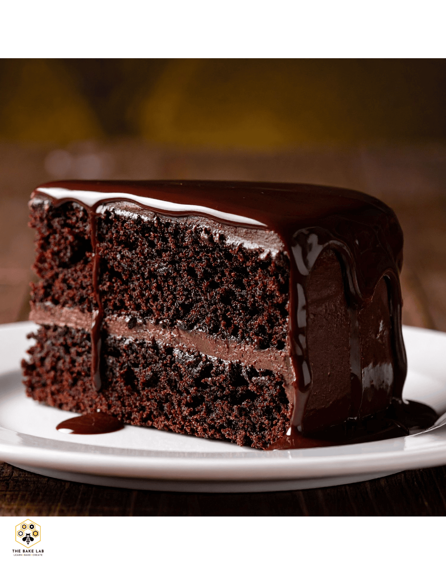 Rich chocolate cake with glossy chocolate ganache icing, perfect for special occasions, baked goods, and dessert lovers. Ideal for custom cake decorating and baking supplies from Over the Top Cake Supplies.