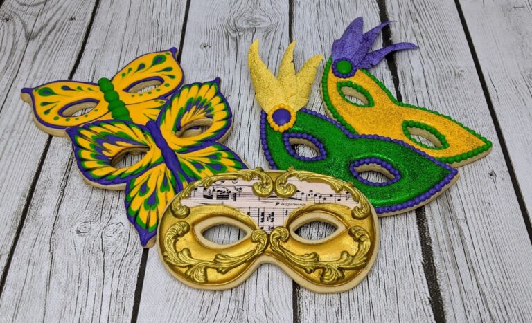 Celebrate Mardi Gras with beautifully crafted sugar masks featuring bright colors, glitter, and intricate details, ideal for cake decoration and themed party events.