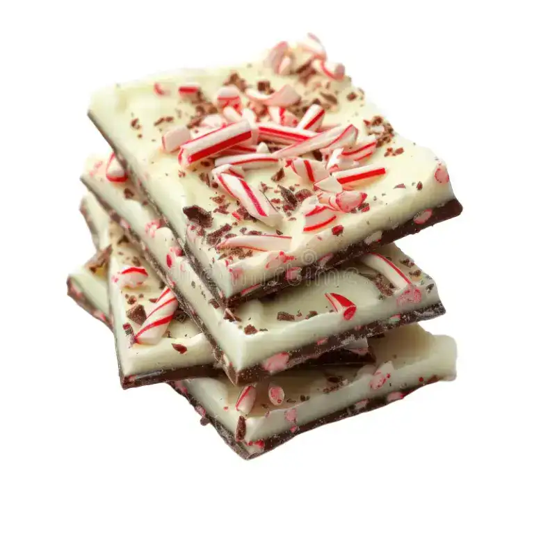 Festive Peppermint Bark. Delicious peppermint bark with white and dark chocolate, crushed peppermint candies, perfect for holiday baking and cake decorating supplies.