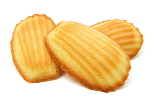 Cake decorating supplies. Golden grilled cookies perfect for cake decorating and dessert presentations, featuring crisp edges and ridged texture ideal for toppings or garnish in cake designs.
