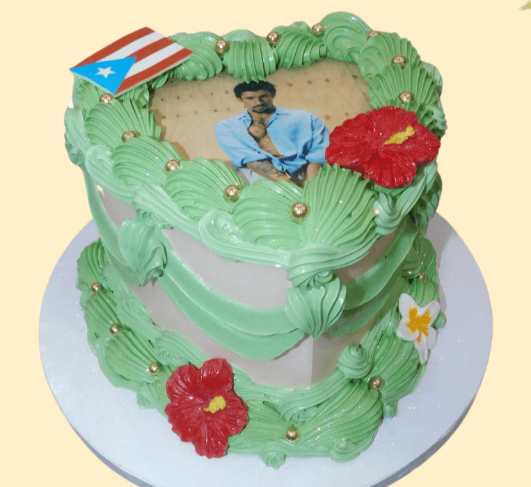 Custom Puerto Rican-themed cake with edible photo and floral decorations.