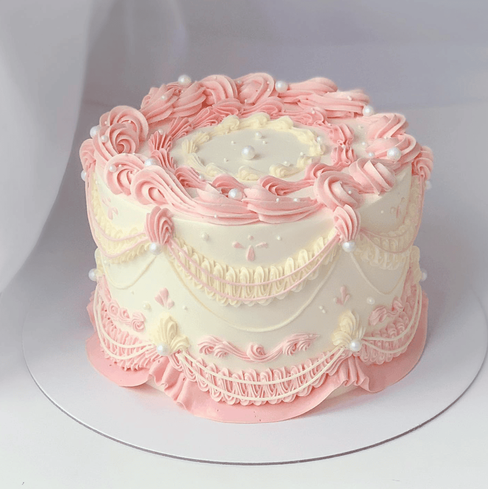 Vintage Style Pink and White Cake for Celebrations.
