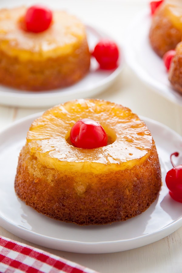 Pineapple Upside-Down Cake - Over the Top Cake Supplies Delicious pineapple upside-down cake topped with cherries, perfect for baking with premium cake supplies from Over the Top Cake Supplies. Ideal for cake decorating and baking enthusiasts.