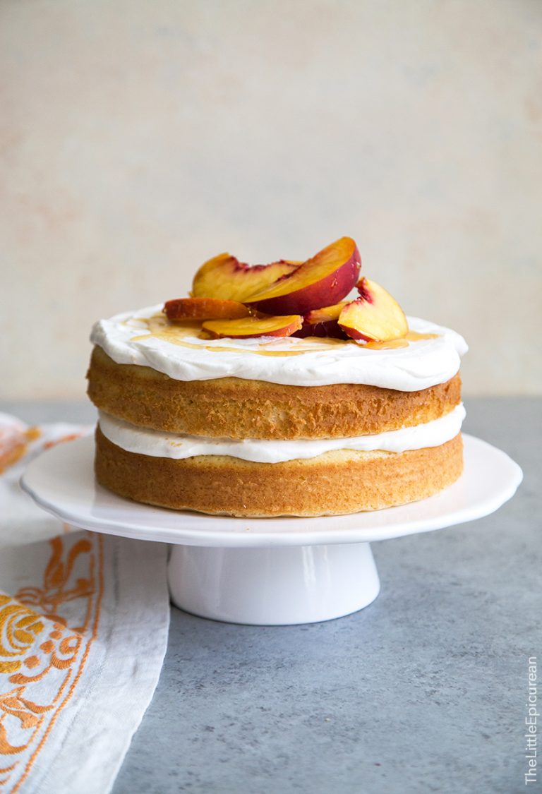 Delicious Peach Bellini Bundt Cake with fresh peaches and a light, fluffy texture, perfect for celebrations or special occasions. Made with high-quality cake supplies from Over the Top Cake Supplies.