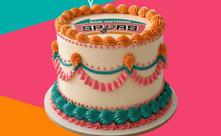 Spurs Pop Up Cake Class & Playoff Watch Party cake featuring team logo and colorful decorations, perfect for sports fans and cake decorating enthusiasts.