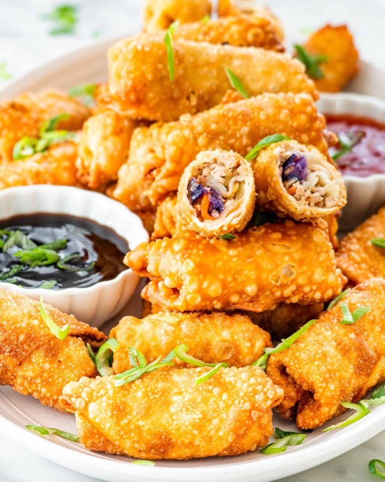 Crispy eggrolls and dumplings with savory fillings, perfect for Asian-inspired desserts and snacks. Ideal for cake decorating supplies and baking needs.
