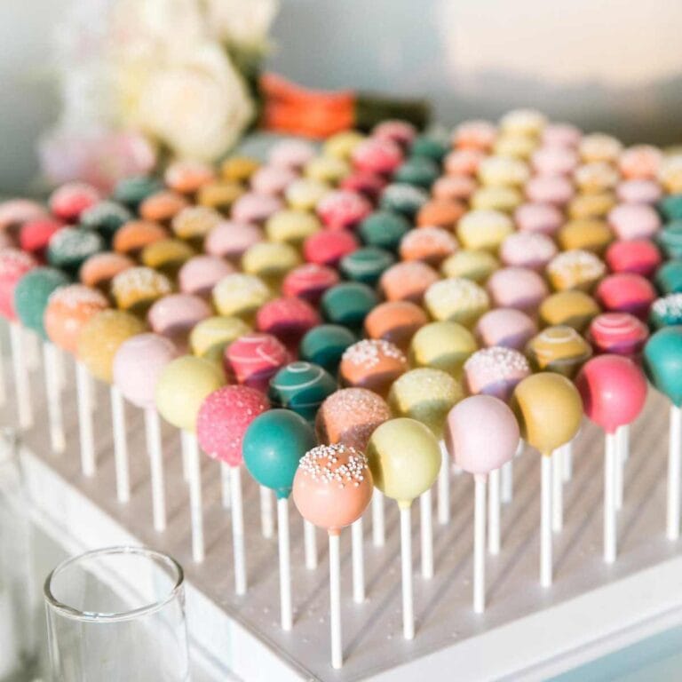 Bright and colorful cake pops arranged on sticks, perfect for parties and celebrations. Made with high-quality ingredients, these cake pops are a fun and delicious treat.