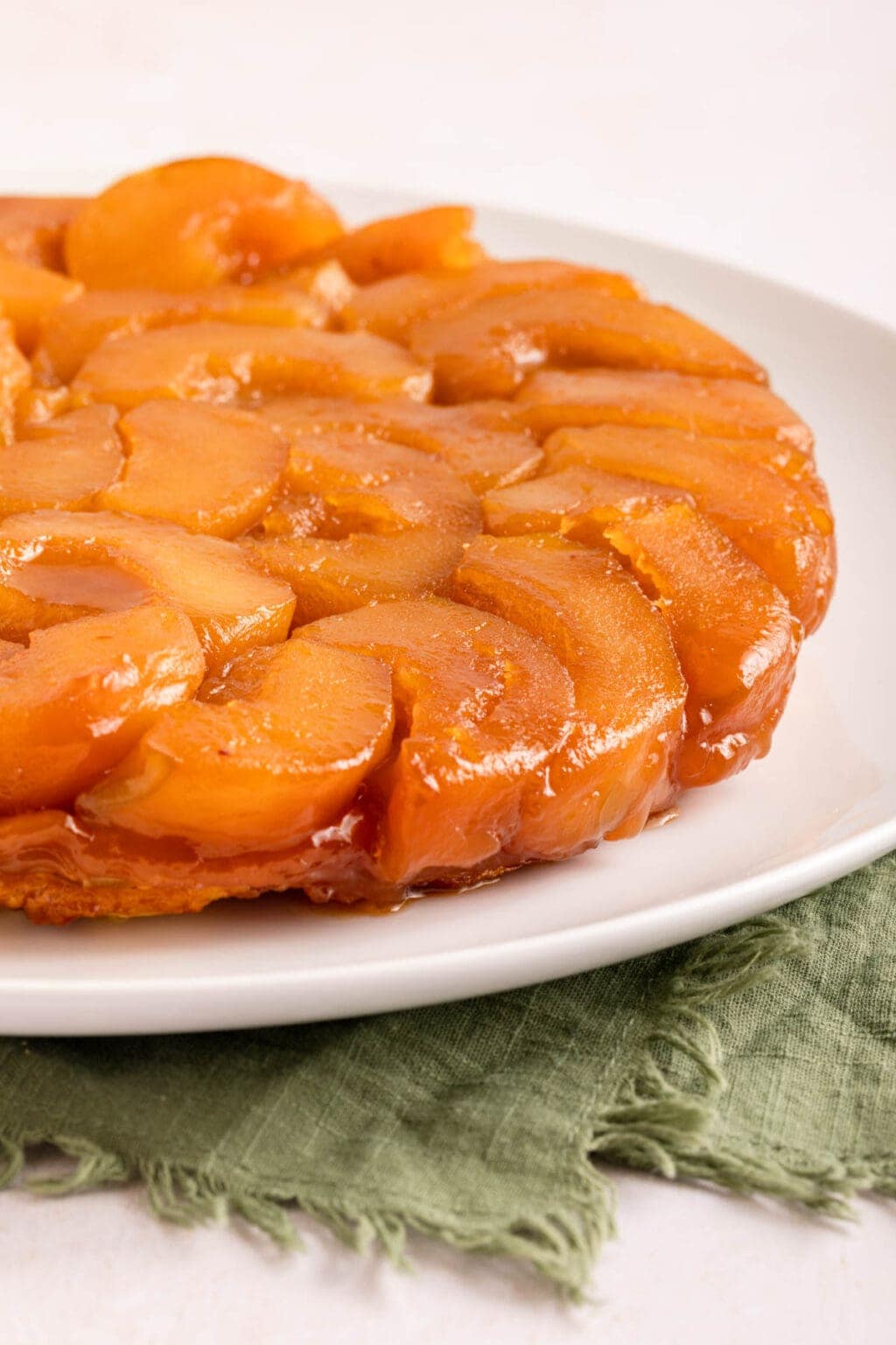 Delicious caramelized apple tart Tatin, showcasing perfect caramelization and flaky pastry, ideal for baking enthusiasts and professional bakers.