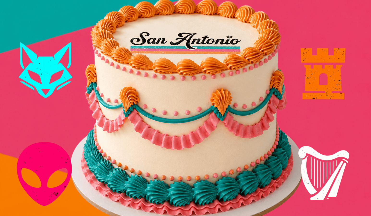 Beautifully decorated custom cake with colorful frosting swirls and "San Antonio" inscription, perfect for celebrations. Ideal for cake decorating supplies and bakery events.